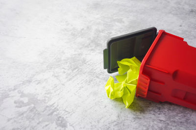 High angle view of yellow toy on snow