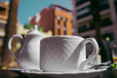 Close-up of coffee cup on table