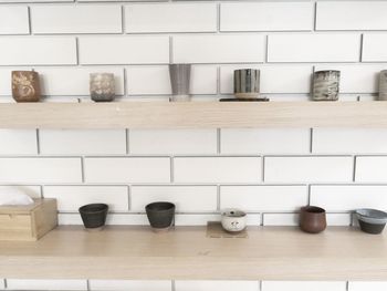 High angle view of objects on floor against wall at home