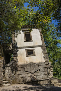 Low angle view of old building against sky