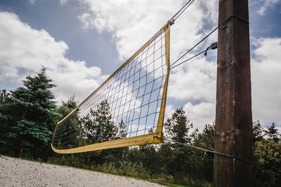 Volleyball net against sky