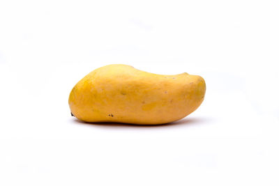 Close-up of fruit against white background