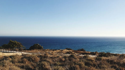 Scenic view of sea against clear sky