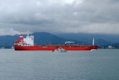 Nautical vessel on sea against sky