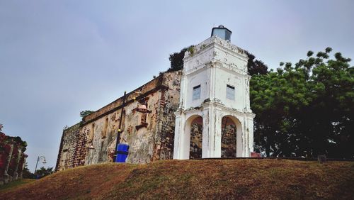 Low angle view of historical building against sky