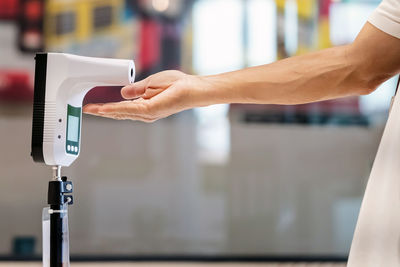 Close-up of hand holding smart phone