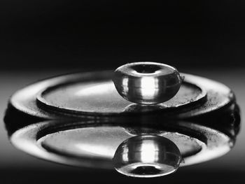 Close-up of electric lamp against black background