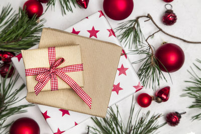 Christmas decoration and gift boxes on table