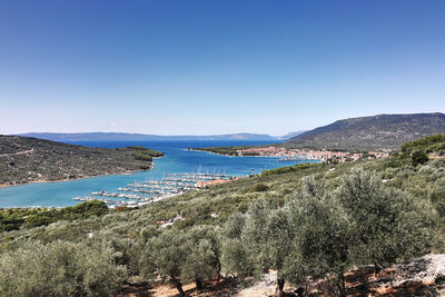 Scenic view of adriatic sea against clear blue sky