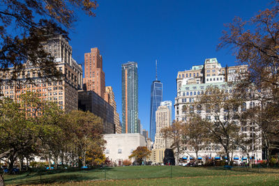 Low angle view of buildings against blue sky