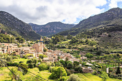 High angle view of townscape against mountains