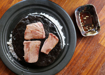 High angle view of bread in container on table