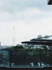 Water drops on glass window of rainy season