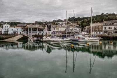 Boats moored in harbor