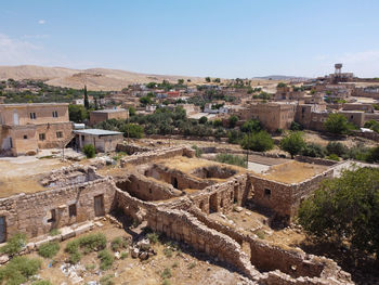 High angle view of old town against sky