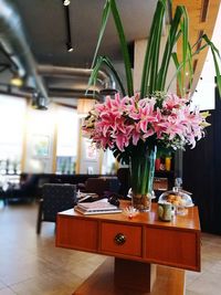 Flower vase on table