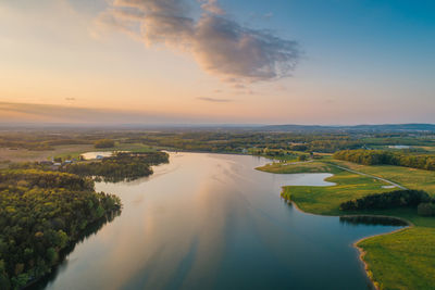 Scenic view of landscape against sky during sunset