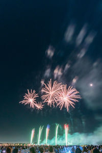 Firework display at night