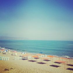 Scenic view of sea against blue sky