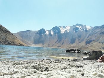 Scenic view of beach against clear sky