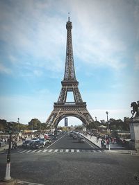 View of tower against cloudy sky