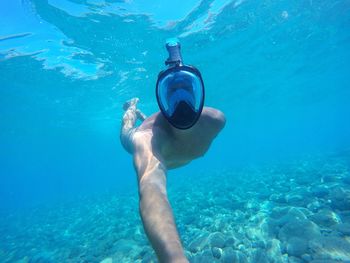 Man swimming in sea