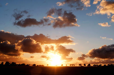 Scenic view of silhouette landscape against sky during sunset