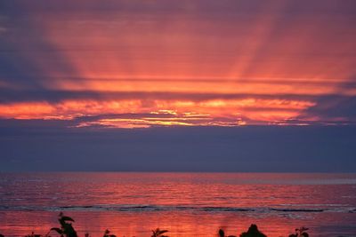 Dramatic sky over sea during sunset