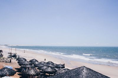 Scenic view of beach against clear sky