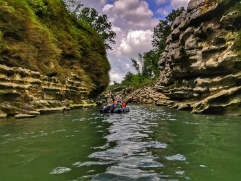 Scenic view of river amidst rocks