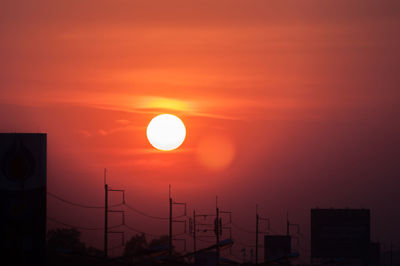 Scenic view of silhouette landscape against romantic sky at sunset