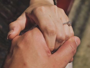 Close-up of person holding hands