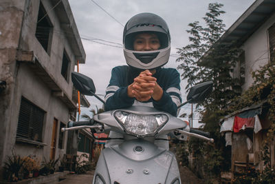 Low angle view of man standing on street