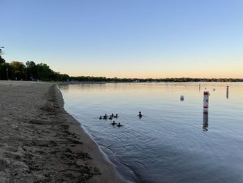 Scenic view of lake against clear sky