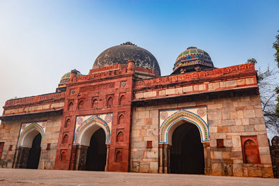 Mosque and tomb of isa khan of humayun tomb exterior view at misty morning from unique perspective