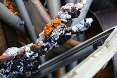 High angle view of snow on metal railing