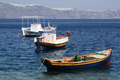 Boat moored in sea