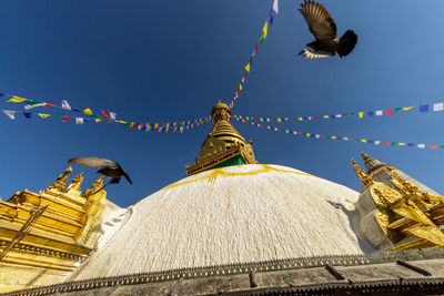 Low angle view of traditional building against sky