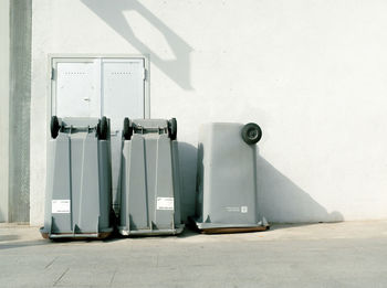 Bins that are upside down along the pathway. 