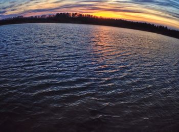 Scenic view of sea at sunset