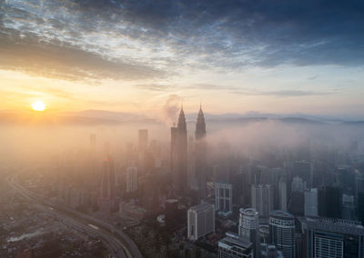 High angle view of cityscape during sunset