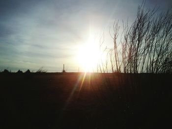 Scenic view of landscape at sunset