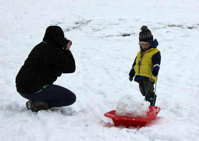 Boys playing in snow
