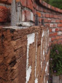 Close-up of rusty brick wall