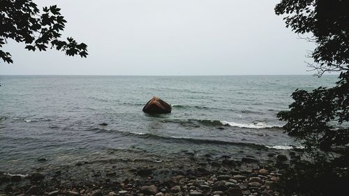 Scenic view of sea against clear sky