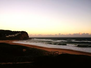 Scenic view of sea at sunset