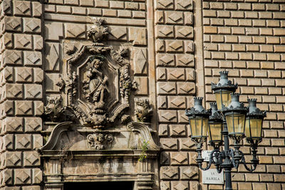 Statue in front of building