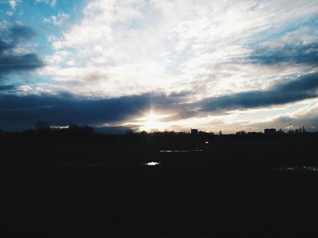 sun, sunset, silhouette, sky, cloud - sky, sunbeam, scenics, sunlight, tranquil scene, tranquility, beauty in nature, landscape, nature, cloud, lens flare, cloudy, idyllic, dark, outdoors, no people