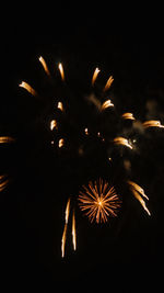 Firework display at night