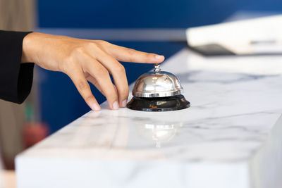 Close-up of man working on table